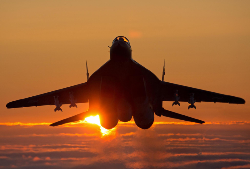 Illustration for article titled These Shots Of Fulcrums and Eurofighters Over Lithuania Are Amazing